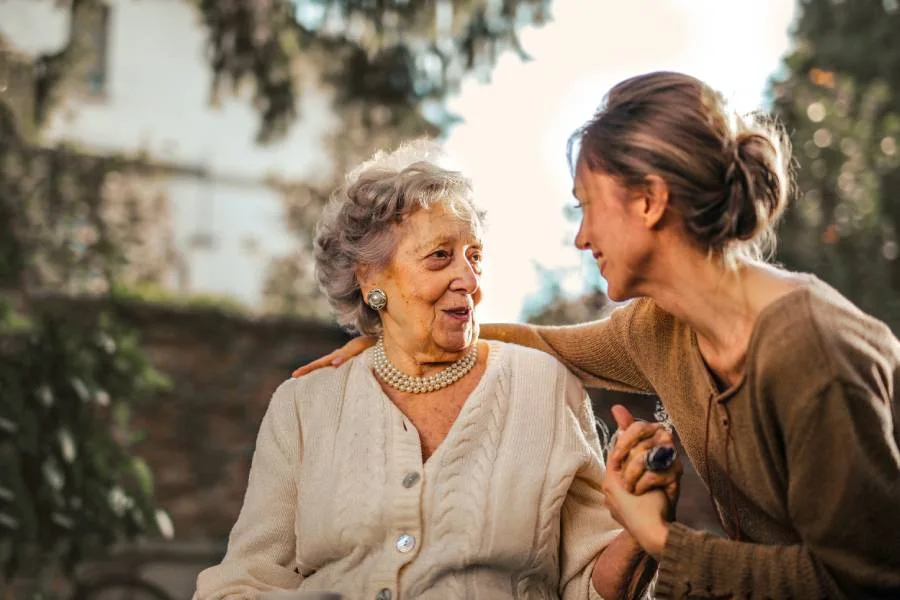 elderly-woman-receiving-caregiver-support-image-mother-touch-care